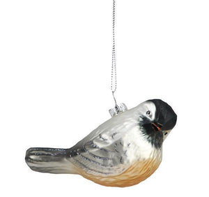 Image of a Christmas ornament that is a chickadee with true to life painting