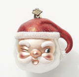 Eric Cortina Winking Santa Face Glass Ornament